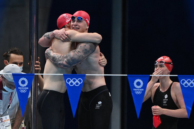 Adam Peaty James Guy Kathleen Dawson celebrate Mixed Medley Relay Tokyo 2020.jpg