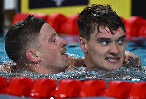 Adam Peaty James Wilby embrace Birmingham 2022