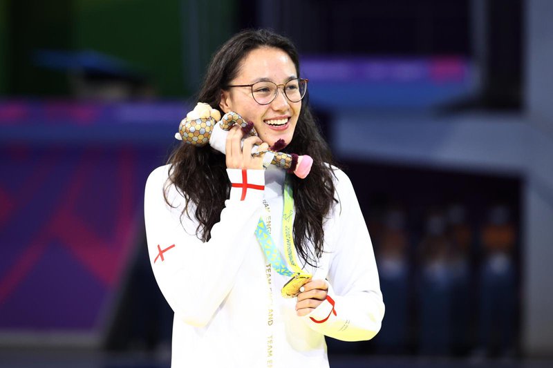 Alice Tai celebrates with gold medal Birmingham 2022