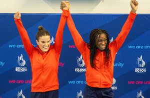 Amy Rollinson Desharne Bent-Ashmeil wave and smile on podium European Games 2023
