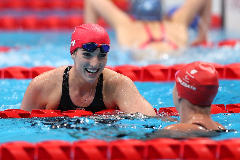 Bethany Firth JJA celebrate S14 100m Back GOLD BRONZE Tokyo 2020 [Getty].jpg