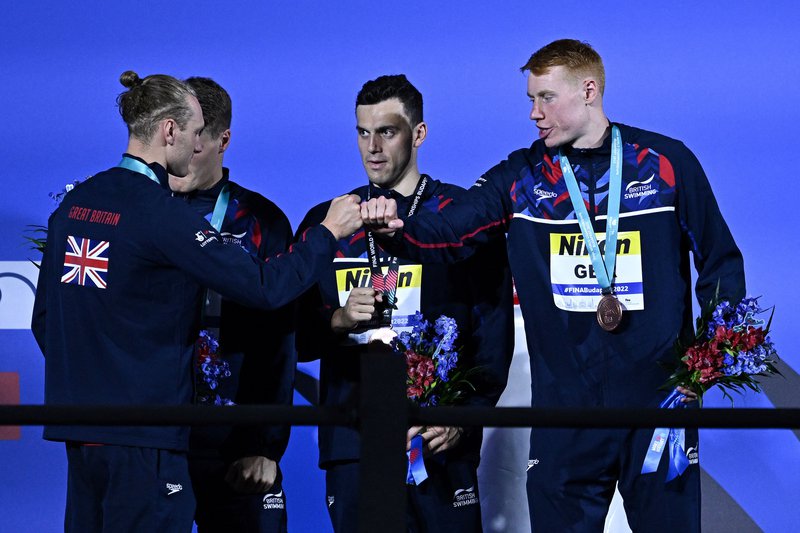 Tom Dean Luke Greenbank fist bump Men's 4x100m Medley Relay medal presentation Budapest 2022